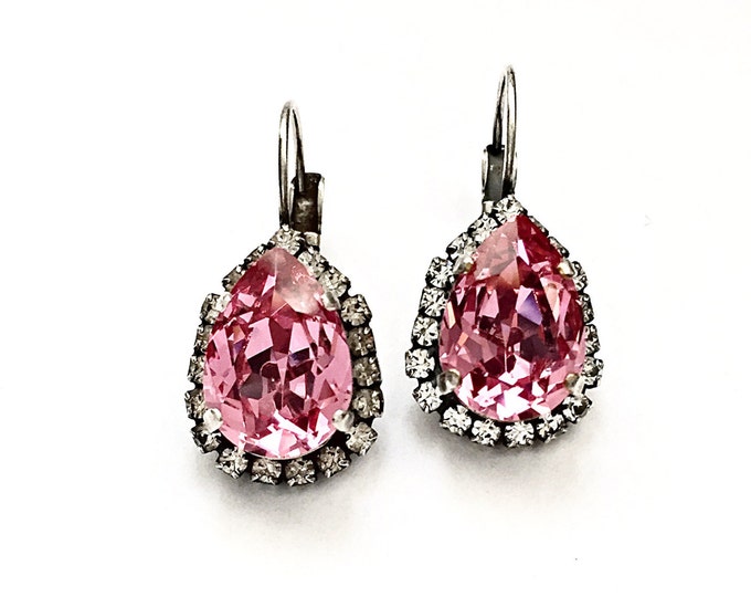 Valentine's romantic pink Swarovski crystal pear shape stone beautifully framed around a halo of sparkling pave stones for a vintage allure