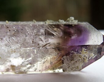 43.6 Gram Enhydro Smoky Phantom Amethyst crystal with side cars 3 inches long with moving bubble. Namibia