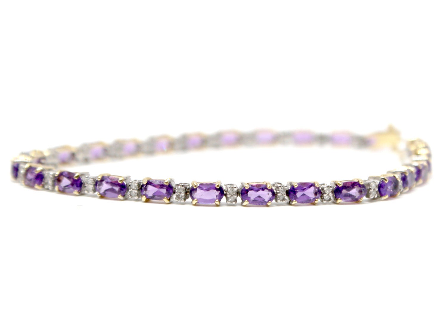 14k yellow gold oval Amethyst and Diamond tennis bracelet