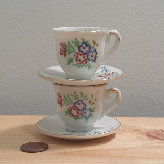 vintage miniature tea cups and saucers