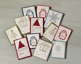 12 French français Self-Adhesive Christmas Gift Tags . Etiquettes Cadeaux Autocollantes de Noël en français . Joyeux Noël Tout le Monde!