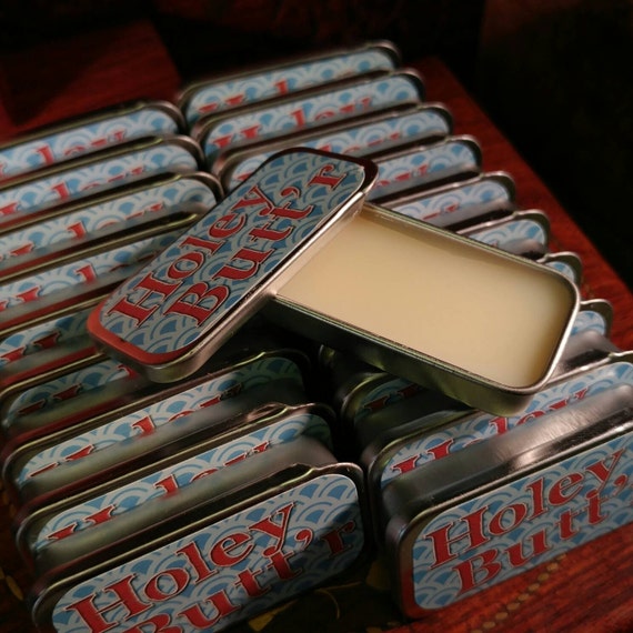 Holey Buttr 10g 1/3oz tin. Vegan stretched ear emollient and