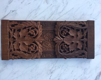 Ornate carved wood bookends