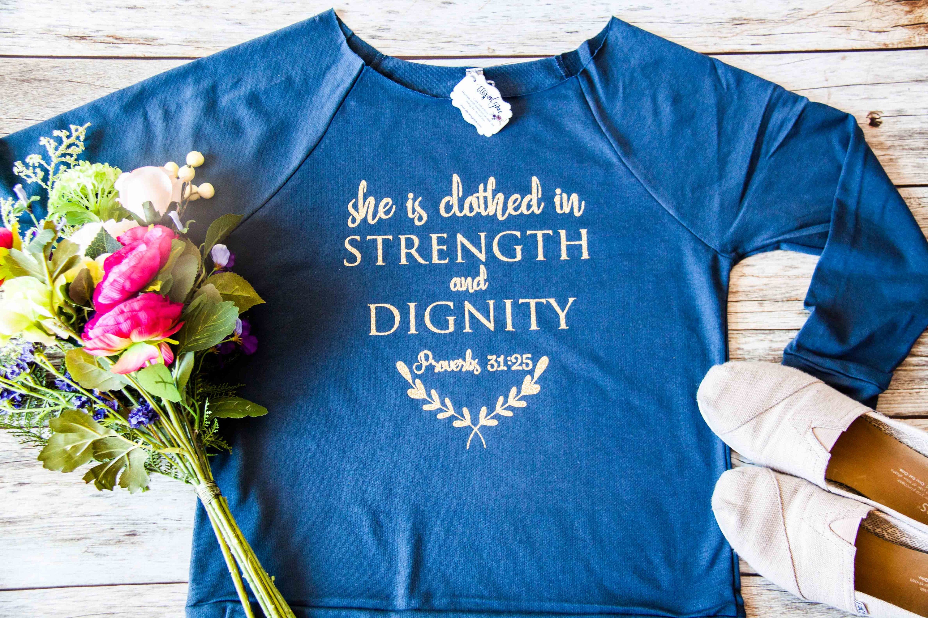 she is clothed in strength and dignity shirt