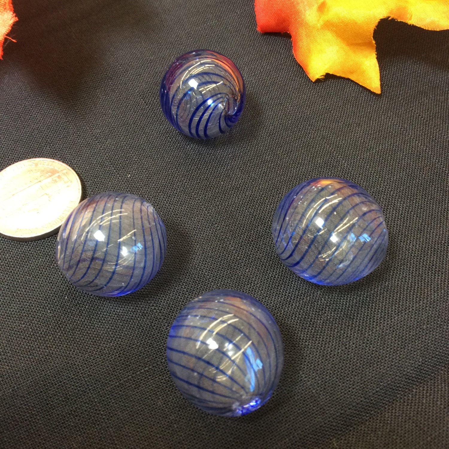 Hand blown glass orbs blue stripe 4 pieces 795 from Cowboybeads on