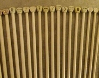 Vintage metal knitting needles, priced per pair.