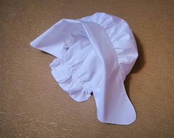 Historical Bonnet. Cap of cotton. Historical headdress.