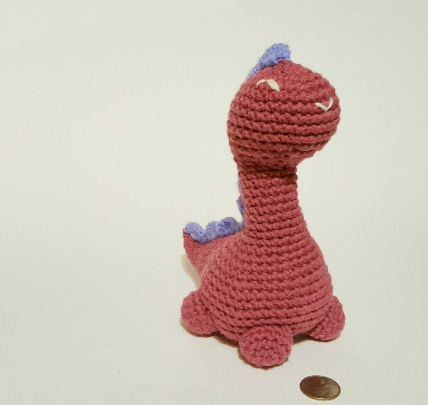 pink dinosaur plush