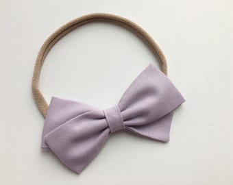 SALE-Baby Girl, Toddler, Girls Handmade Fabric Bow on a Nylon Headband or Hair Clip- Light purple