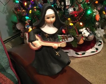 Vintage Napcoware Black Habit Nun Playing Guitar Singing Nun Numbered C7129 1960's Catholic Nun