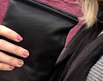 Black recycled leather fold over clutch with magnetic snaps