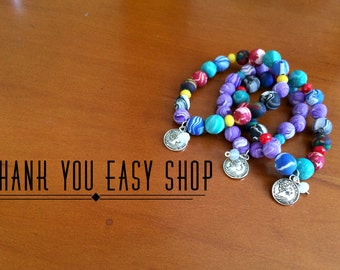 Colorful polymer clay bracelet with charms