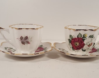 Set of 2 vintage floral Imperial bone china teacups and saucers; Made in England