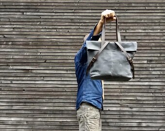 Waxed canvas tote bag with leather handles and fold to close top / waterproof tote bag