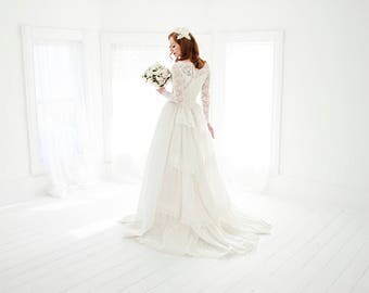 Vintage 1950s wedding dress, white illusion lace long sleeve gown, train, S