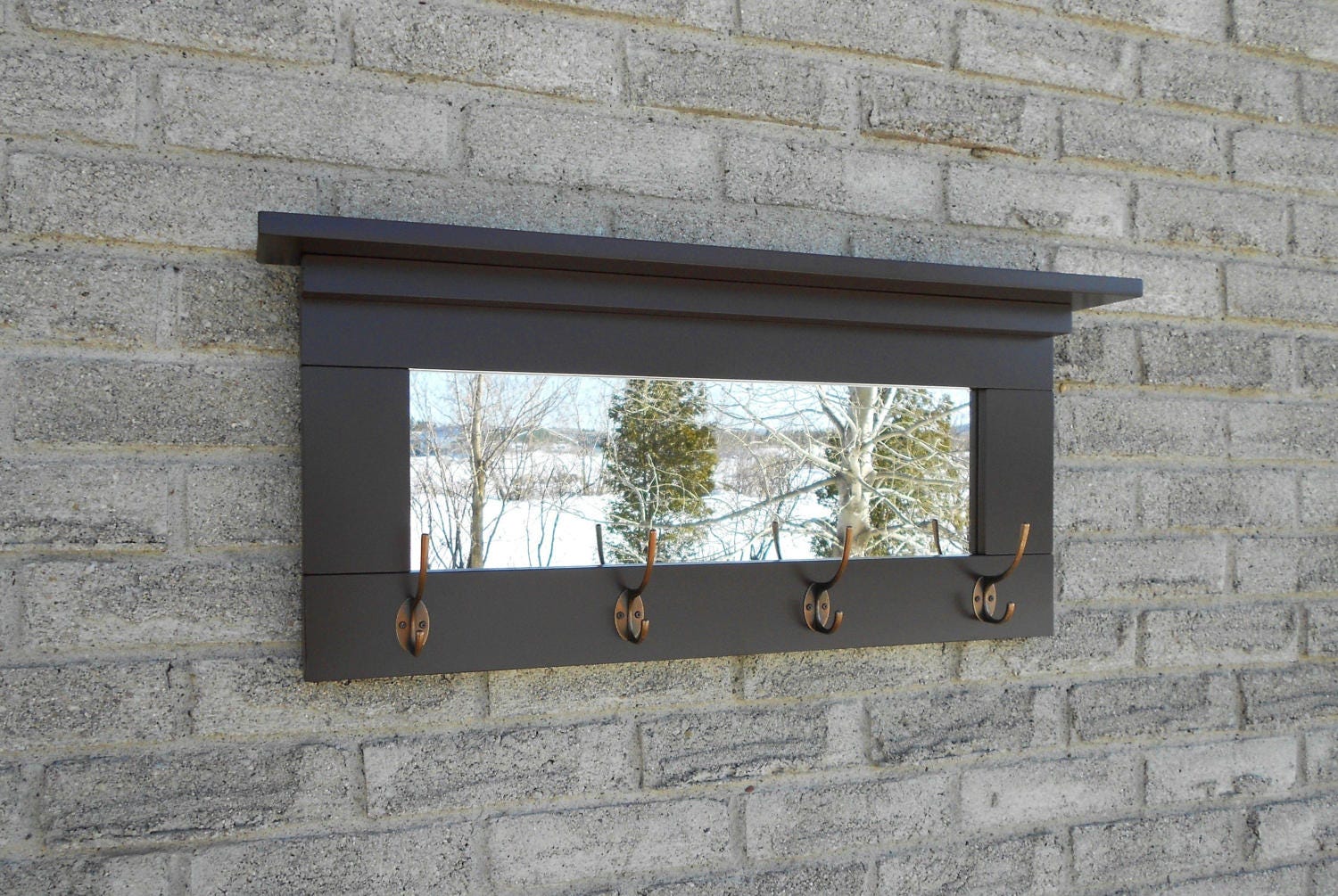 Espresso color entry mirror with oil rubbed bronze hooks wall