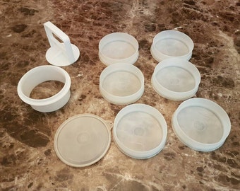 Vintage tupperware hamburger press with 6 containers