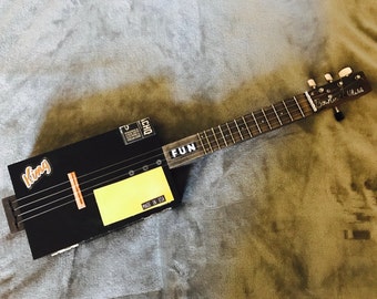 4 String Acoustic/Electric Cigar Box Guitar/Ukulele by Travis Bowlin