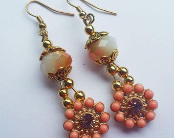 Peach and gold flower dangle earrings with 12x9 mm Sand opal AB glass crystal, gold bead caps.