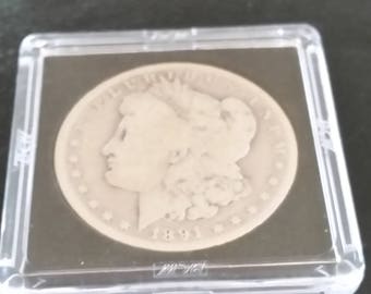 1891-O Morgan silver dollar