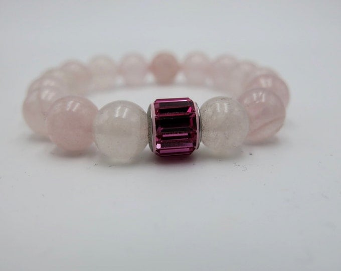 Natural heart healing rose quartz beaded stretch bracelet 10mm beads, Swarovski Elements pink crystal charm bead. Be Charmed from Swarovski