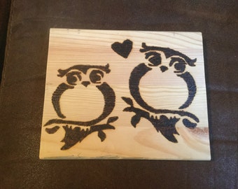 Owls in love hanging