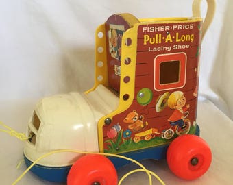 Vintage Fisher Price Little People Pull A long Shoe.