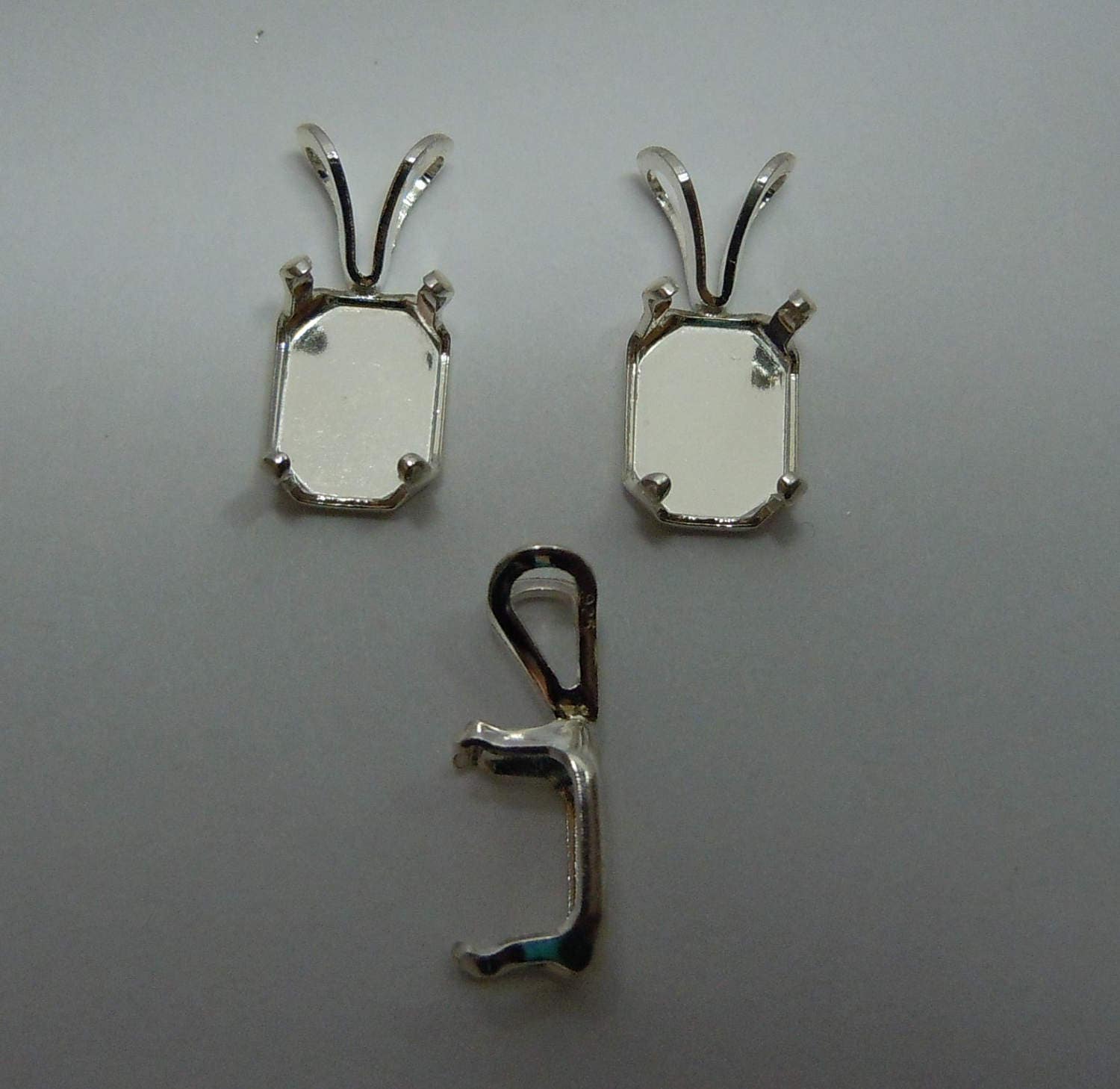 THREE 9x7 emerald SNAP tite set in solitaire PENDANT mounts settings