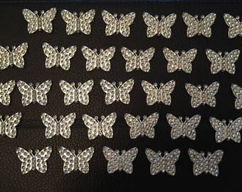 30 plastic silver butterflies