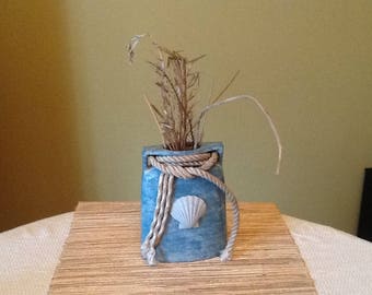 Shell and rope vase with sea grass