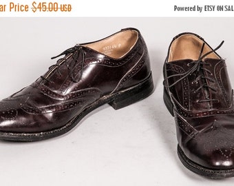 brown and white wingtip