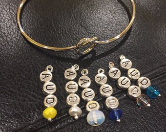 Audiology adjustable knot bracelet