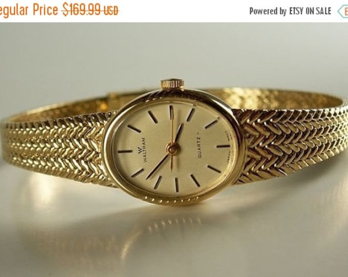 Storewide 25% Off SALE Sophisticated Vintage Ladies Waltham Quartz Watch Designed in a Gold-Tone Band & Dial