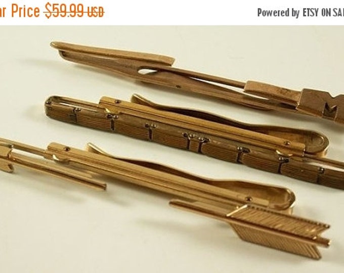 Storewide 25% Off SALE lovely Collection of three vintage designer styled goldtone masculine tie bars, two of which are adjustable