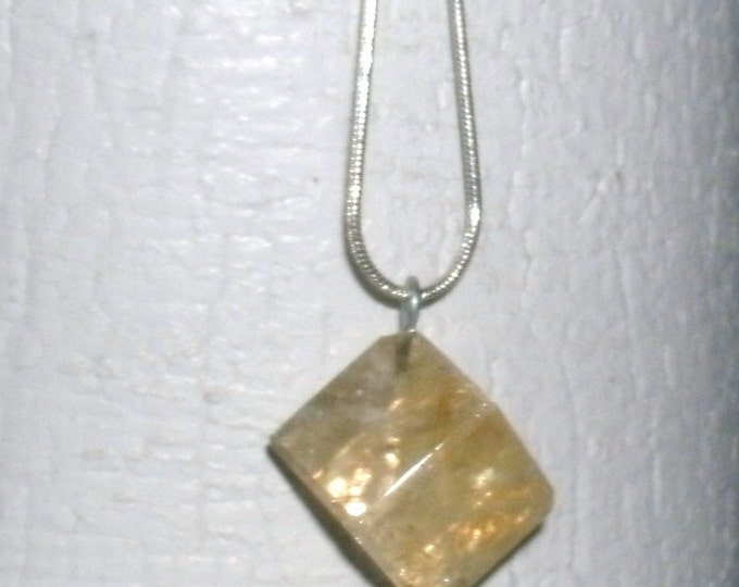 Lemon Quartz Cube Necklace, eye pin hanger, hangs on a diagonal, light showing translucent light yellow crystal, 925 stamped sterling chain