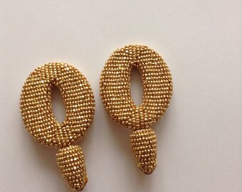 O Beaded Earrings Earrings in the style of Oscar De La Renta long tassle clip on earrings