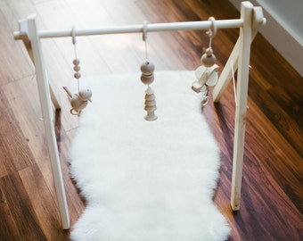 Wooden Baby Gym ↠ Natural Wood Play Gym Foldable ↠ Eco-friendly Organic Toys ↠ Scandinavian Minimalism Stylish ↠ Gentle Sensory Toys