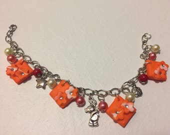 Polymer clay bracelet with charms