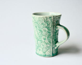 Teal mug with Australian Flannel Flower design