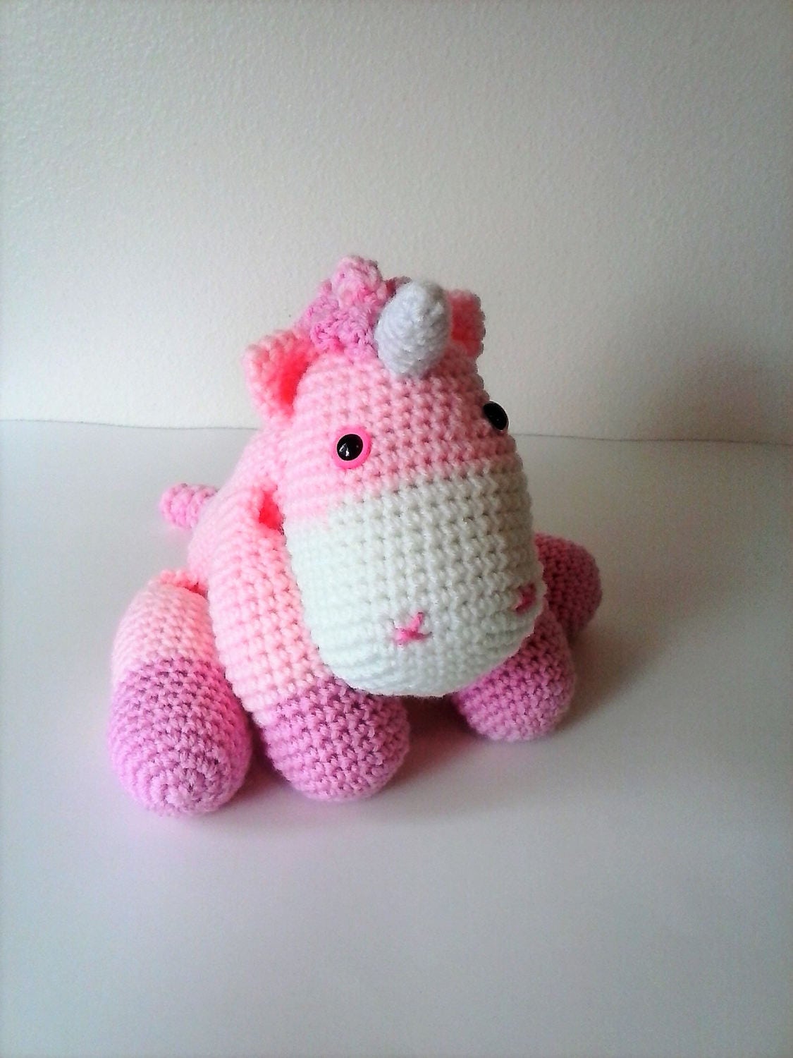 pink unicorn cuddly toy