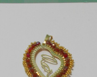 Gold Virgin Mary Pendant with Ruby-like gems