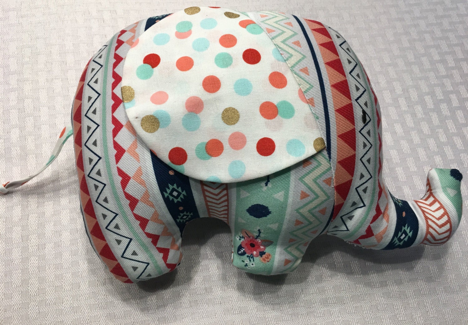 mint green stuffed elephant