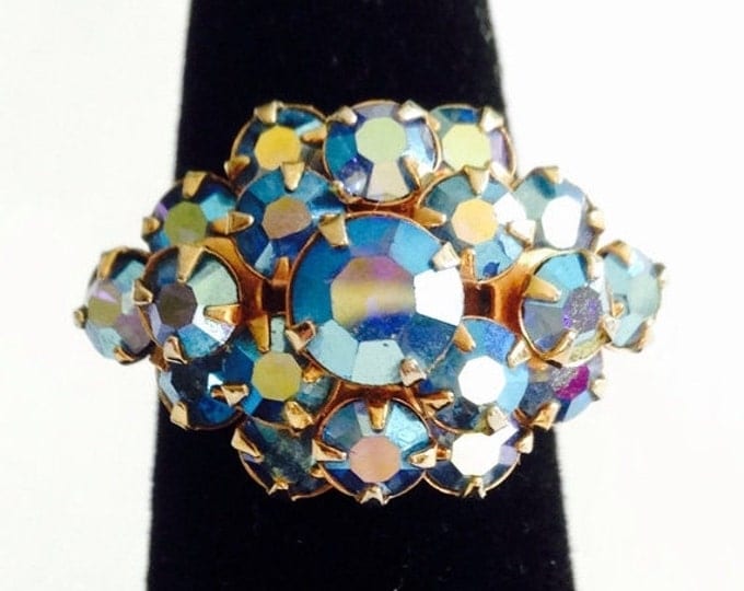 Storewide 25% Off SALE Vintage Gold Tone Iridescent Blue Cluster Rhinestone Designer Cocktail Ring Featuring Prong Set Faceted Design