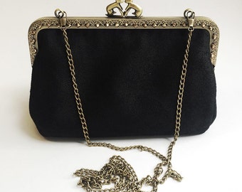 black suede effect clutch bag