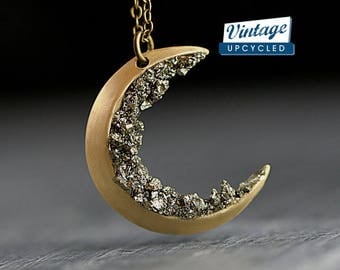 New: Crushed crystal crescent moon necklace. Genuine vintage crescent moon upcycled with crushed pyrite. Brass gold with long necklace.