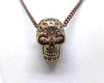 Intriguing Human Skull Gold Tone Necklace