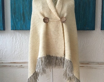 Organic wool shawl/wrap/poncho with fringes with coconut shell buttons.Hand knit shawl.Hand knitted Blanket scarf.Wedding hand knitted shawl