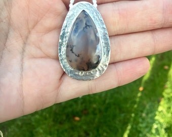 Dendrite agate pendant with textured setting