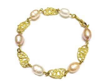 Bracelet in 18kt yellow gold with freshwater pearls