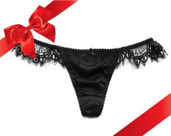 Black thong panties in stretch silk and chantilly lace